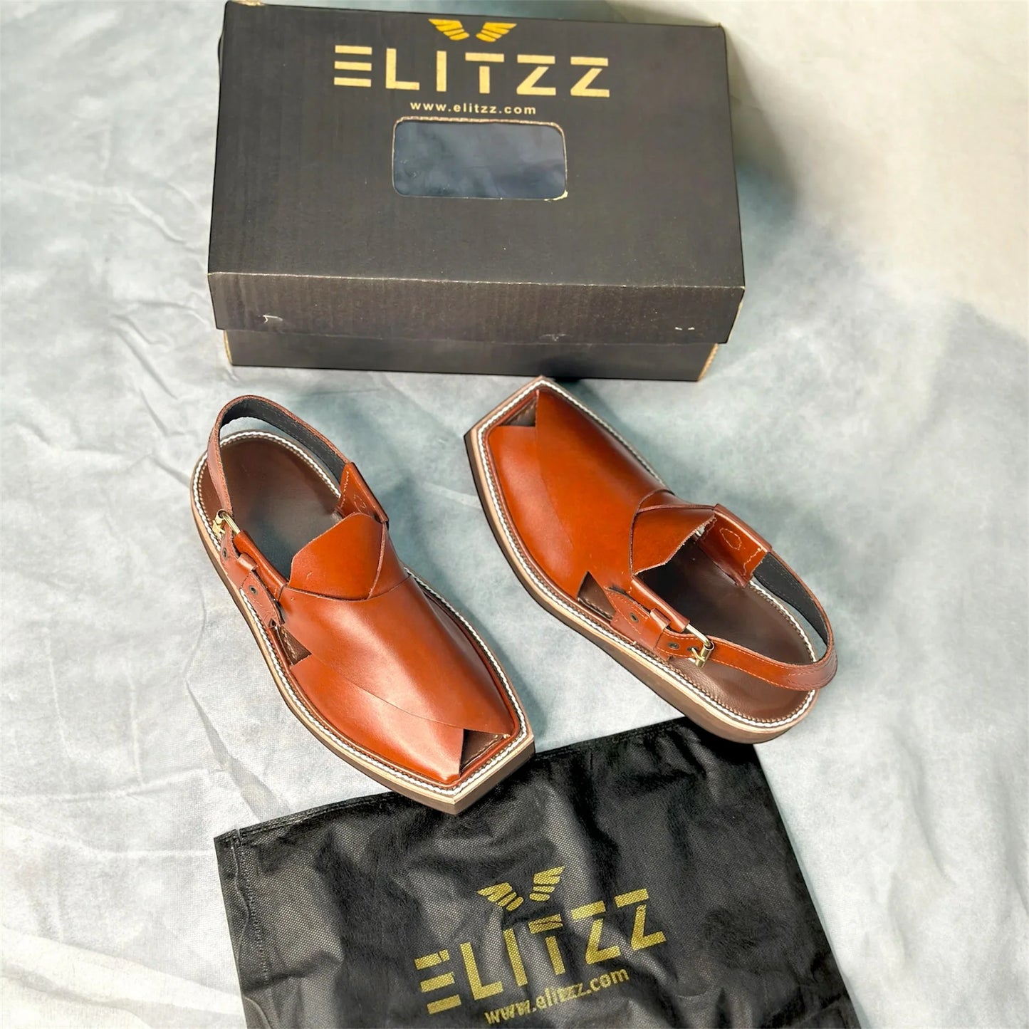 Elitzz brown leather men's traditional sandals with slingback straps, box, and black branded dust bag